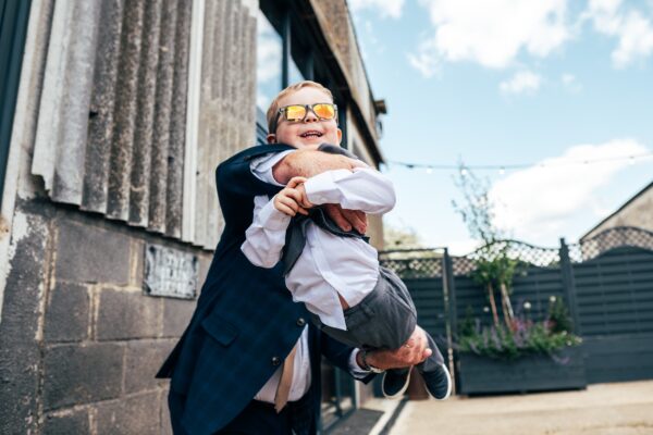 Spring brights & black tie for rustic glamour at The Barns at Lodge Farm. Essex documentary wedding photographer