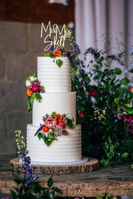 Spring brights & black tie for rustic glamour at The Barns at Lodge Farm. Essex documentary wedding photographer