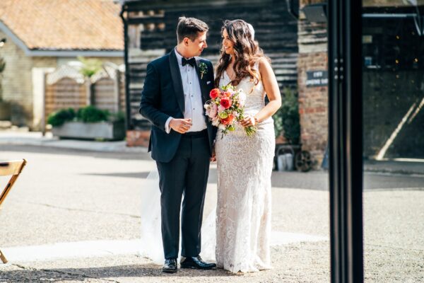 Spring brights & black tie for rustic glamour at The Barns at Lodge Farm. Essex documentary wedding photographer