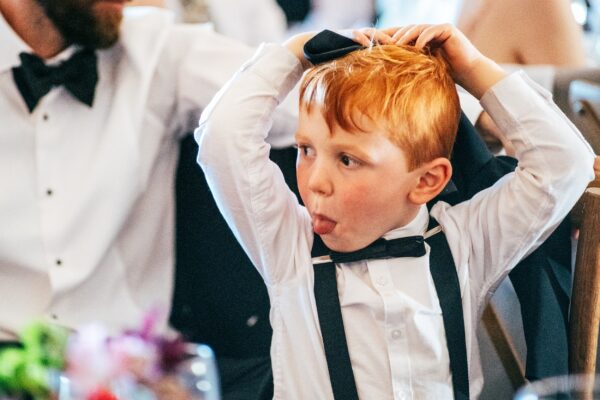 Spring brights & black tie for rustic glamour at The Barns at Lodge Farm. Essex documentary wedding photographer