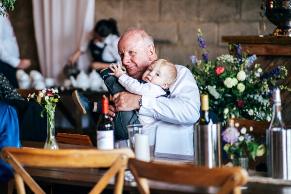 Spring brights & black tie for rustic glamour at The Barns at Lodge Farm. Essex documentary wedding photographer