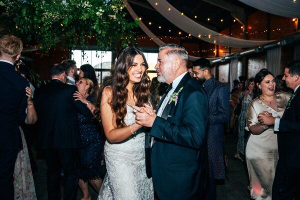 Spring brights & black tie for rustic glamour at The Barns at Lodge Farm. Essex documentary wedding photographer