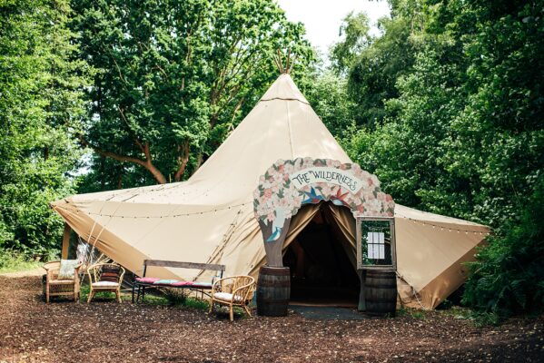 Chilled out festival vibes for Amy & Dom at Wilderness Wedding Venue. Essex & Kent documentary wedding photographer