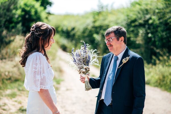 Chilled out festival vibes for Amy & Dom at Wilderness Wedding Venue. Essex & Kent documentary wedding photographer