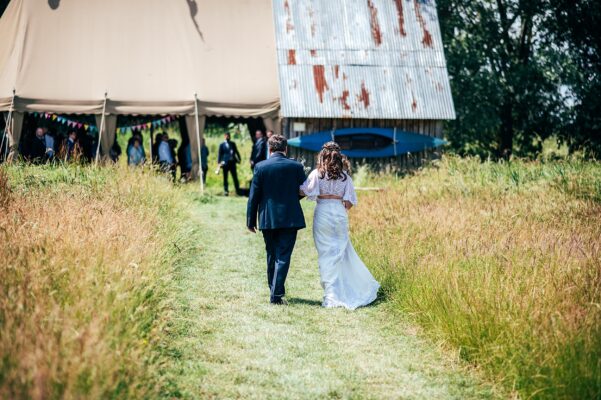 Chilled out festival vibes for Amy & Dom at Wilderness Wedding Venue. Essex & Kent documentary wedding photographer