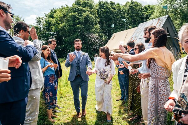 Chilled out festival vibes for Amy & Dom at Wilderness Wedding Venue. Essex & Kent documentary wedding photographer