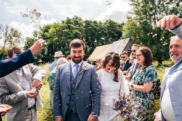 Chilled out festival vibes for Amy & Dom at Wilderness Wedding Venue. Essex & Kent documentary wedding photographer