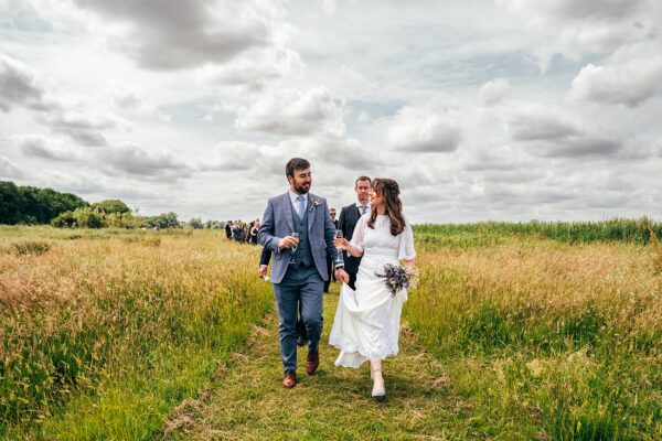 Chilled out festival vibes for Amy & Dom at Wilderness Wedding Venue. Essex & Kent documentary wedding photographer