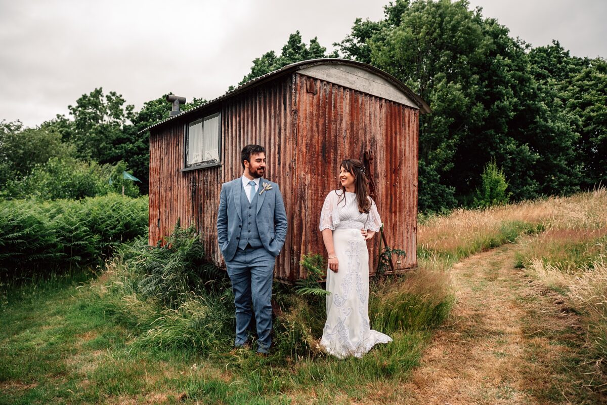 Chilled out festival vibes for Amy & Dom at Wilderness Wedding Venue. Essex & Kent documentary wedding photographer