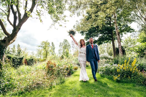 Disco balls, piglets & summer brights for an ultra chill, boho wedding vibe at South Farm Essex Hertfordshire Wedding Photographer