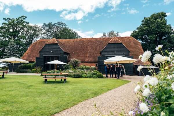 Pastel pink for an intimate summer wedding at Blake Hall Best Essex Documentary Wedding Photographer