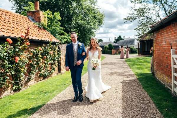 Pastel pink for an intimate summer wedding at Blake Hall Best Essex Documentary Wedding Photographer