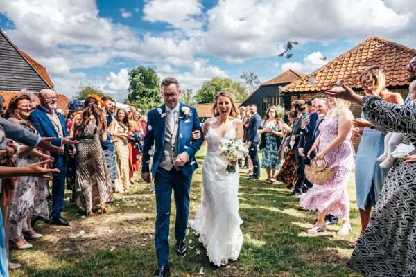 Pastel pink for an intimate summer wedding at Blake Hall Best Essex Documentary Wedding Photographer