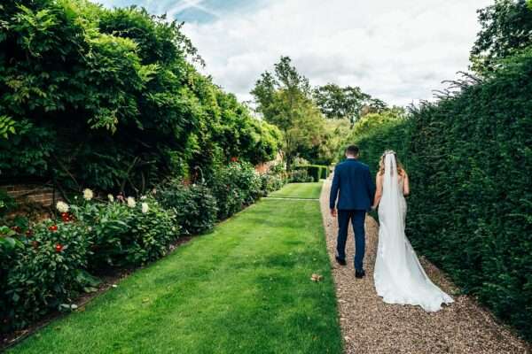 Pastel pink for an intimate summer wedding at Blake Hall Best Essex Documentary Wedding Photographer