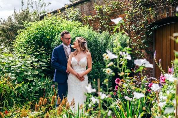 Pastel pink for an intimate summer wedding at Blake Hall Best Essex Documentary Wedding Photographer