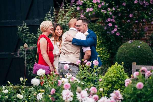 Pastel pink for an intimate summer wedding at Blake Hall Best Essex Documentary Wedding Photographer