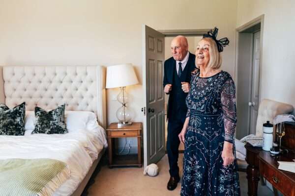 Impossibly chic, black tie wedding at The Hare's Field, with Bridesmaids in mismatched pinks and dried flowers. Best Essex Documentary Wedding Photographer