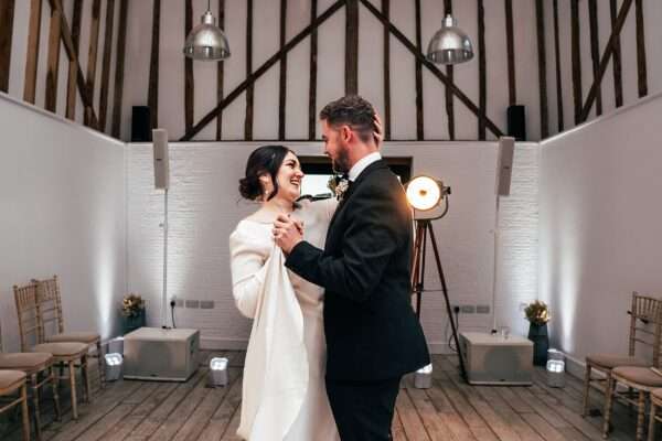 Impossibly chic, black tie wedding at The Hare's Field, with Bridesmaids in mismatched pinks and dried flowers. Best Essex Documentary Wedding Photographer