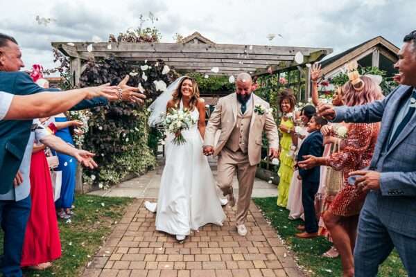 Neutrals & Greens for a laid back Summer wedding at Maidens Barn Best Essex Documentary Wedding Photographer