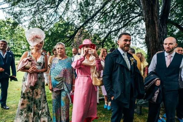 Guests take photos outside Essex church