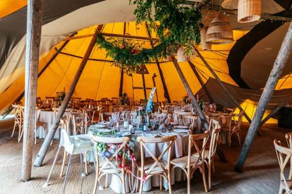 table decor inside back garden Essex tipi wedding