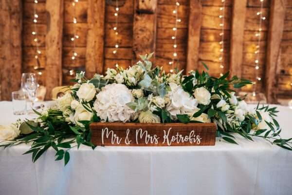 "Rustic barn summer wedding at Blake Hall in Essex with relaxed and happy bride and groom captured in a natural documentary style, perfect for anxious or nervous couples seeking authentic and beautiful wedding photography."