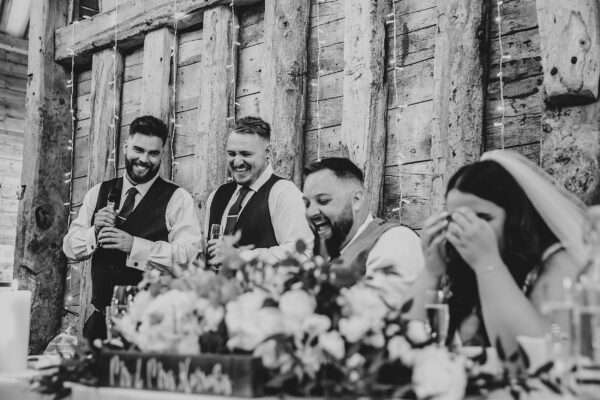 "Rustic barn summer wedding at Blake Hall in Essex with relaxed and happy bride and groom captured in a natural documentary style, perfect for anxious or nervous couples seeking authentic and beautiful wedding photography."