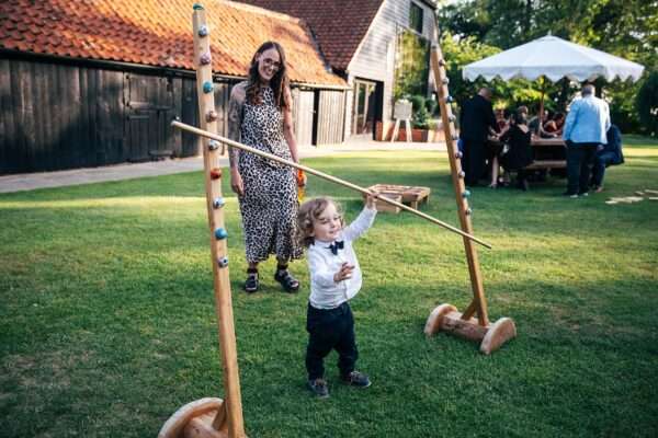 "Rustic barn summer wedding at Blake Hall in Essex with relaxed and happy bride and groom captured in a natural documentary style, perfect for anxious or nervous couples seeking authentic and beautiful wedding photography."