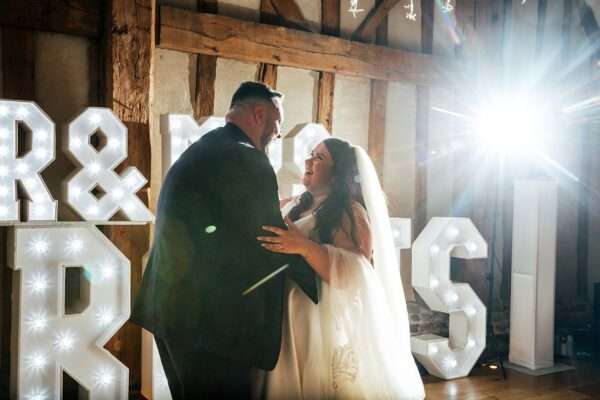 "Rustic barn summer wedding at Blake Hall in Essex with relaxed and happy bride and groom captured in a natural documentary style, perfect for anxious or nervous couples seeking authentic and beautiful wedding photography."