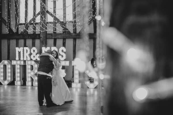 "Rustic barn summer wedding at Blake Hall in Essex with relaxed and happy bride and groom captured in a natural documentary style, perfect for anxious or nervous couples seeking authentic and beautiful wedding photography."