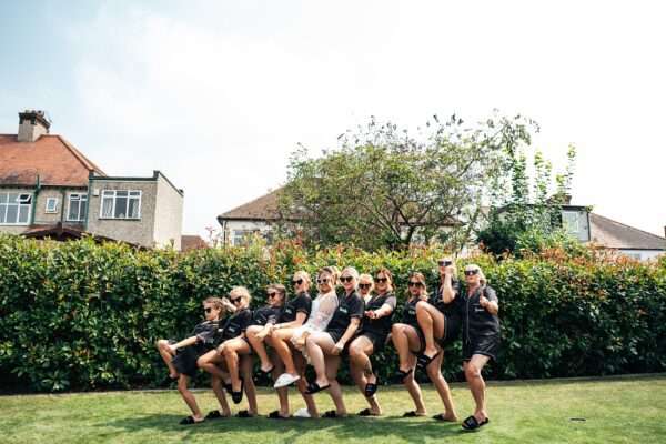 "Outdoor summer wedding at The Boundary in Essex with relaxed and happy bride and groom captured in a natural documentary style, perfect for anxious or nervous couples seeking authentic and beautiful wedding photography."