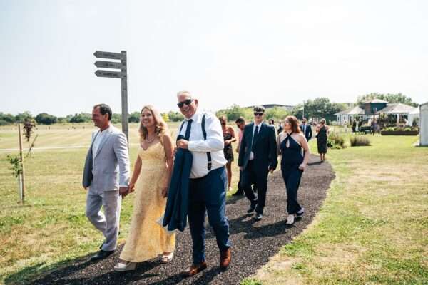 "Outdoor summer wedding at The Boundary in Essex with relaxed and happy bride and groom captured in a natural documentary style, perfect for anxious or nervous couples seeking authentic and beautiful wedding photography."