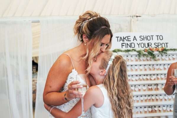 "Outdoor summer wedding at The Boundary in Essex with relaxed and happy bride and groom captured in a natural documentary style, perfect for anxious or nervous couples seeking authentic and beautiful wedding photography."