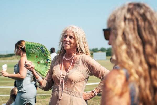 "Outdoor summer wedding at The Boundary in Essex with relaxed and happy bride and groom captured in a natural documentary style, perfect for anxious or nervous couples seeking authentic and beautiful wedding photography."