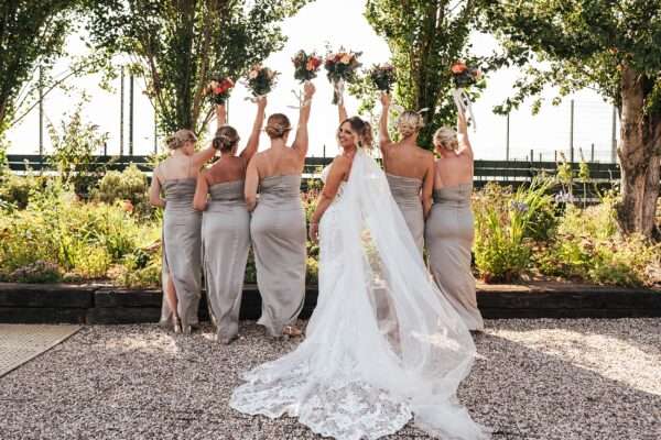 "Outdoor summer wedding at The Boundary in Essex with relaxed and happy bride and groom captured in a natural documentary style, perfect for anxious or nervous couples seeking authentic and beautiful wedding photography."