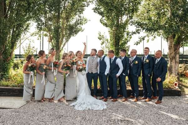 "Outdoor summer wedding at The Boundary in Essex with relaxed and happy bride and groom captured in a natural documentary style, perfect for anxious or nervous couples seeking authentic and beautiful wedding photography."