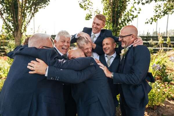 "Outdoor summer wedding at The Boundary in Essex with relaxed and happy bride and groom captured in a natural documentary style, perfect for anxious or nervous couples seeking authentic and beautiful wedding photography."