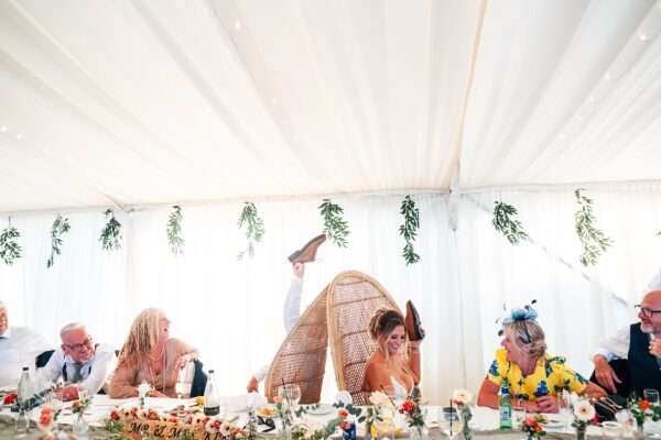 "Outdoor summer wedding at The Boundary in Essex with relaxed and happy bride and groom captured in a natural documentary style, perfect for anxious or nervous couples seeking authentic and beautiful wedding photography."