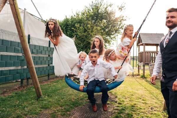 "Outdoor summer wedding at The Boundary in Essex with relaxed and happy bride and groom captured in a natural documentary style, perfect for anxious or nervous couples seeking authentic and beautiful wedding photography."