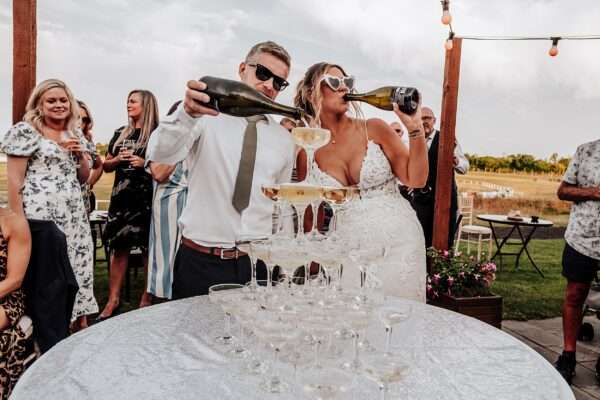 "Outdoor summer wedding at The Boundary in Essex with relaxed and happy bride and groom captured in a natural documentary style, perfect for anxious or nervous couples seeking authentic and beautiful wedding photography."