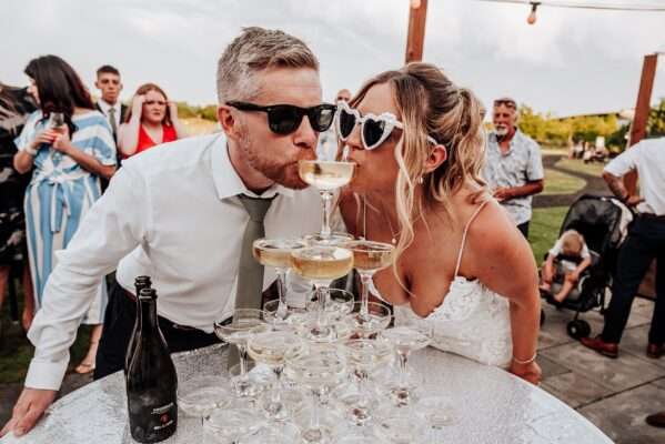 "Outdoor summer wedding at The Boundary in Essex with relaxed and happy bride and groom captured in a natural documentary style, perfect for anxious or nervous couples seeking authentic and beautiful wedding photography."