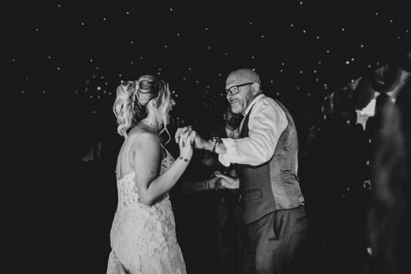 "Outdoor summer wedding at The Boundary in Essex with relaxed and happy bride and groom captured in a natural documentary style, perfect for anxious or nervous couples seeking authentic and beautiful wedding photography."