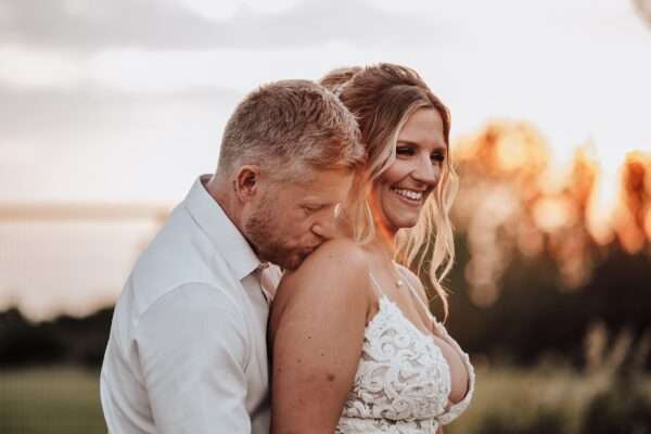 "Outdoor summer wedding at The Boundary in Essex with relaxed and happy bride and groom captured in a natural documentary style, perfect for anxious or nervous couples seeking authentic and beautiful wedding photography."