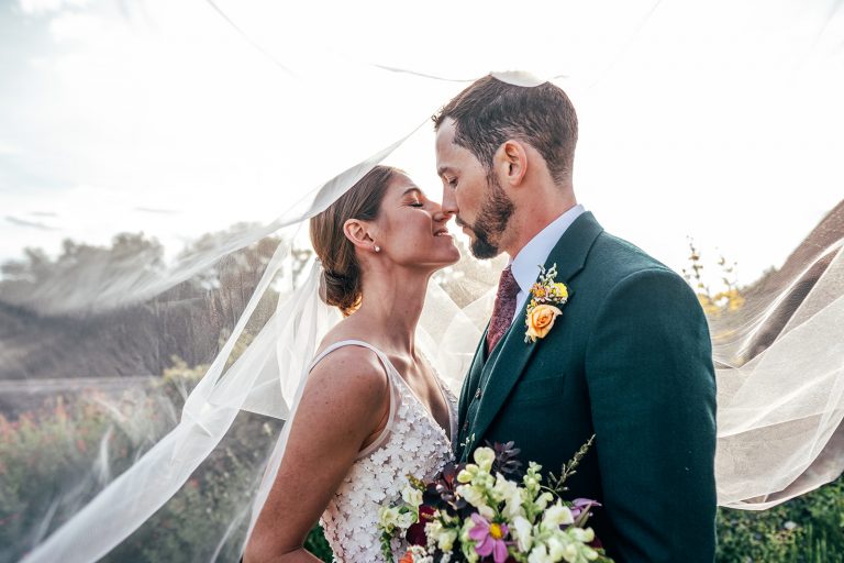 A Vintage Railway Wedding at East Anglian Railway Museum. Bride wears Lillian West. Essex documentary wedding photographer