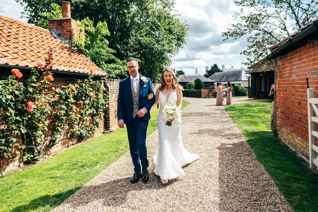 Pastel pinks for an intimate summer wedding at Blake Hall recommended Essex Wedding Photographer