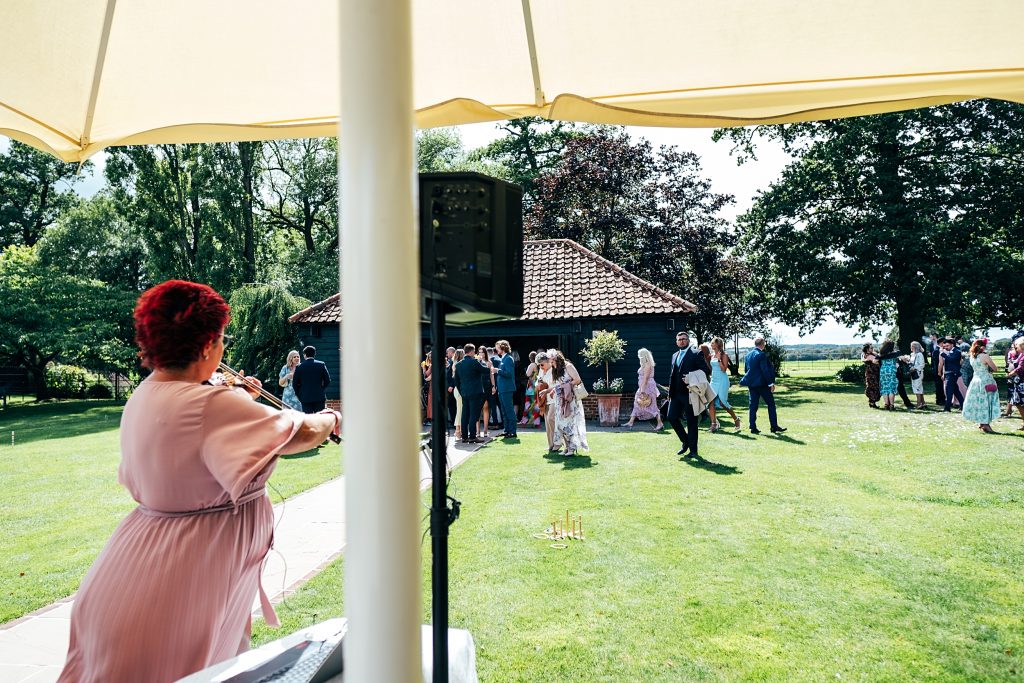 Pastel pinks for an intimate summer wedding at Blake Hall recommended Essex Wedding Photographer