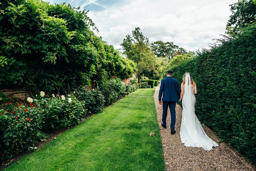 Pastel pinks for an intimate summer wedding at Blake Hall recommended Essex Wedding Photographer
