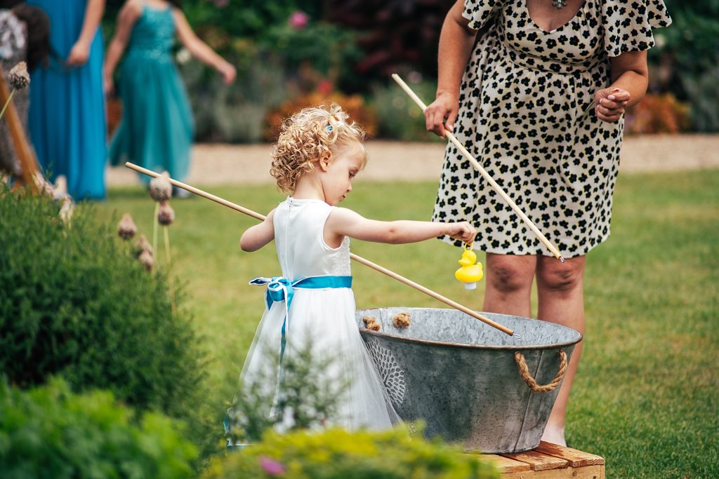 flower girl hooks a duck