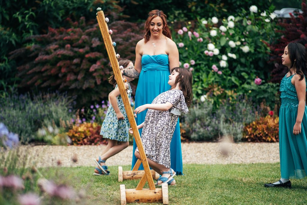 little girls play limbo