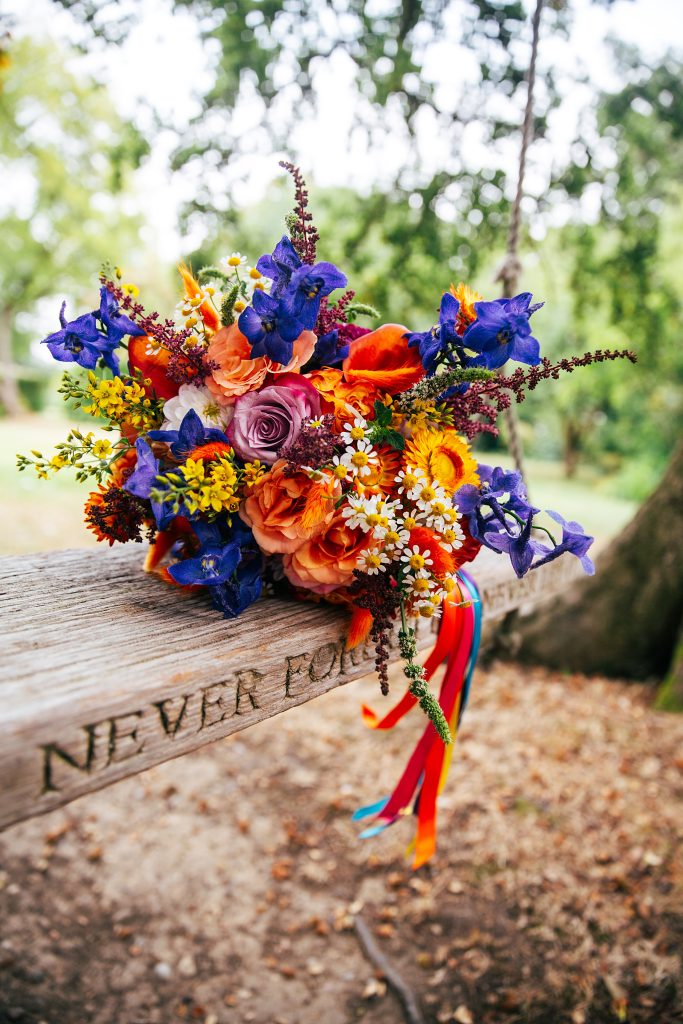 close up of colourful bouquet on swing